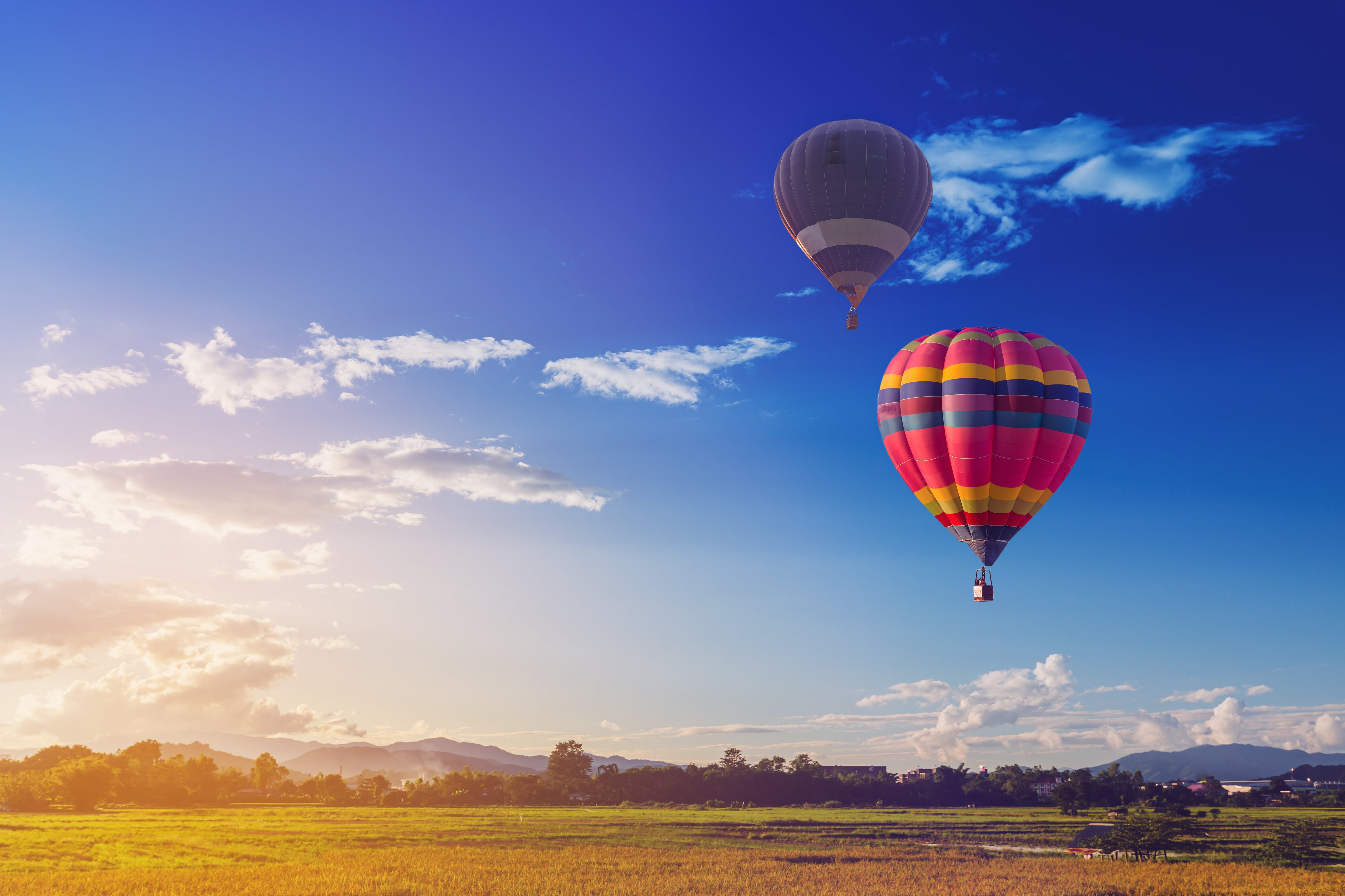 Hot air balloon in blue sky and cloud nature background